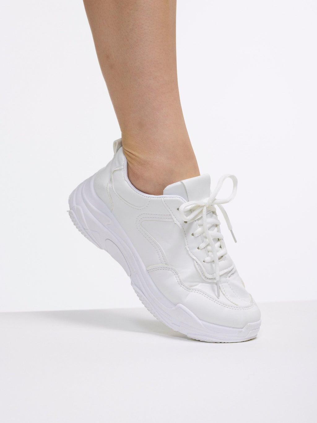 The Perfect Simple Chunky White Sneaker | Cool Yet Sensible for Every Day Wear | All White Lace Up Running Shoe Style | Goose Taffy